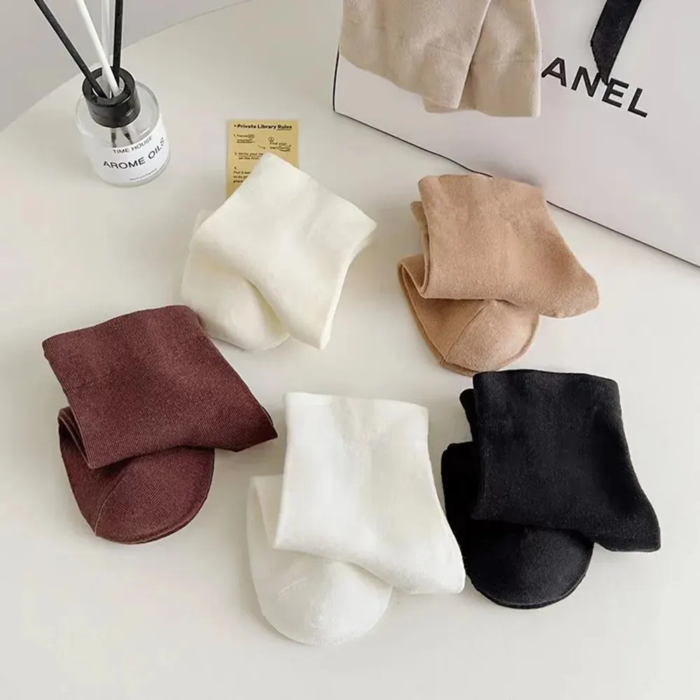 Женские носки до середины икры с круглым вырезом