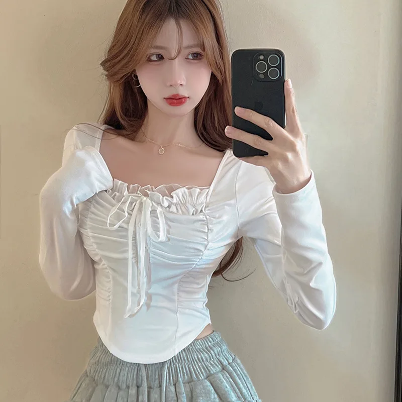 

Пикантная тонкая рубашка с длинным рукавом и деревянными ушками, женская футболка с длинным рукавом, дизайнерские нишевые сращивающиеся Короткие топы, трендовые Топы