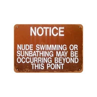 notice nude swimming and sunbathing vintage look metal signcustom wood appearance metal bar sign
