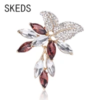 skeds luxury crystal women flower metal brooch pin elegant rhinestone pendant jewelry lady party wedding accessories corsage