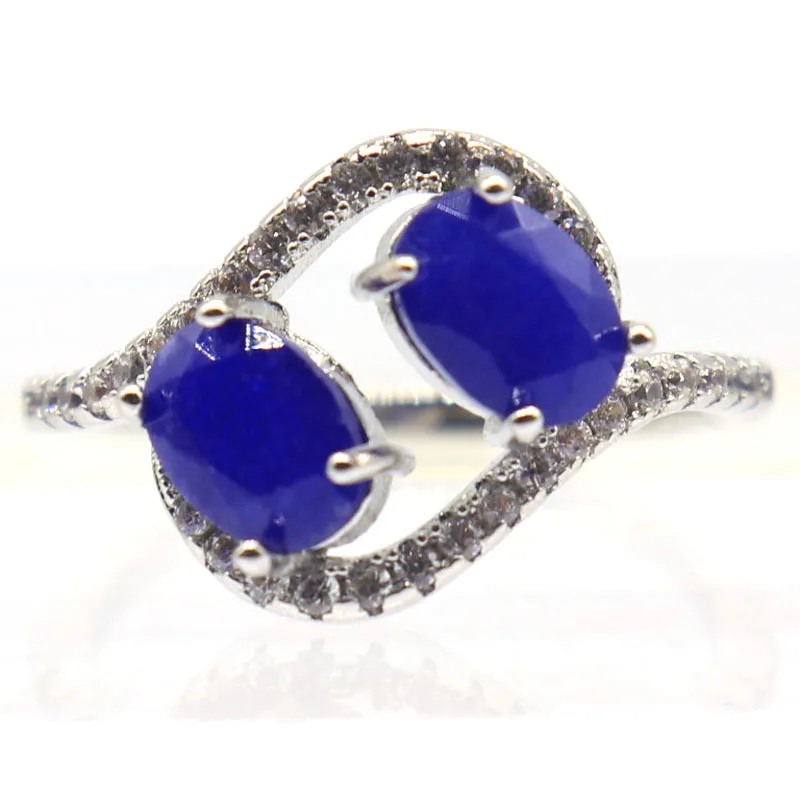 Женское серебряное кольцо с красным рубином 14x13 мм