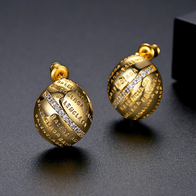 Женские и мужские серьги-гвоздики с фианитом овальной формы