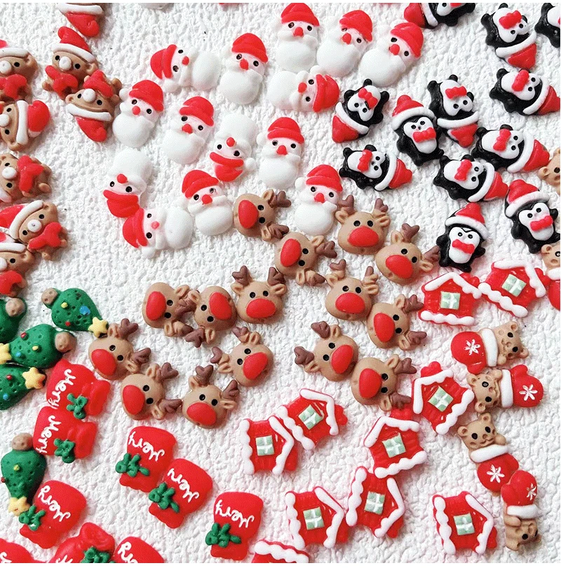 

100pcs BabyGirl Nailart Christmas Festival Series Charms Red Celebrity Merry Pockets,Elk Deer, Man Resin Manicure Ornaments 2023