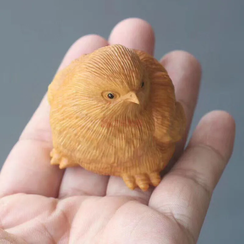 

Миниатюрная деревянная статуэтка курицы