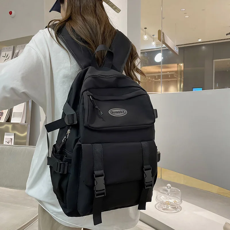 

Крутая Женская дорожная сумка с пряжкой, однотонный школьный ранец для девочек с несколькими карманами, Модный водонепроницаемый нейлоновый женский рюкзак