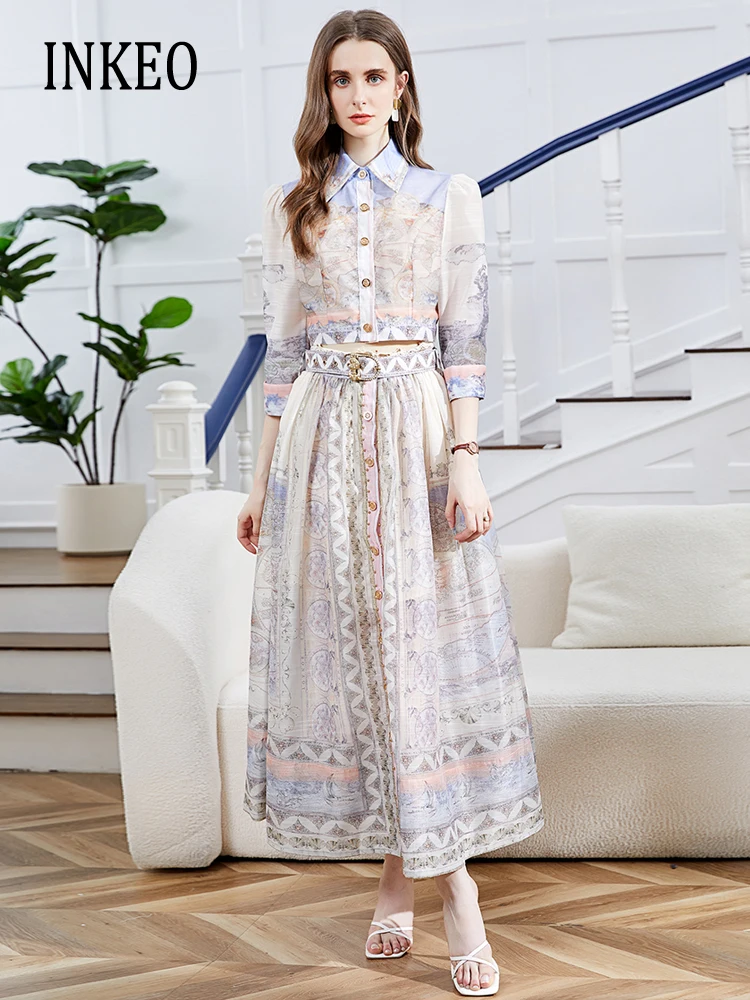 

Женская блузка с длинным рукавом и плиссированная юбка