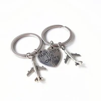 a pair of partner creative keychains of the long distance friendship sister keyring of the criminal airplane key chain