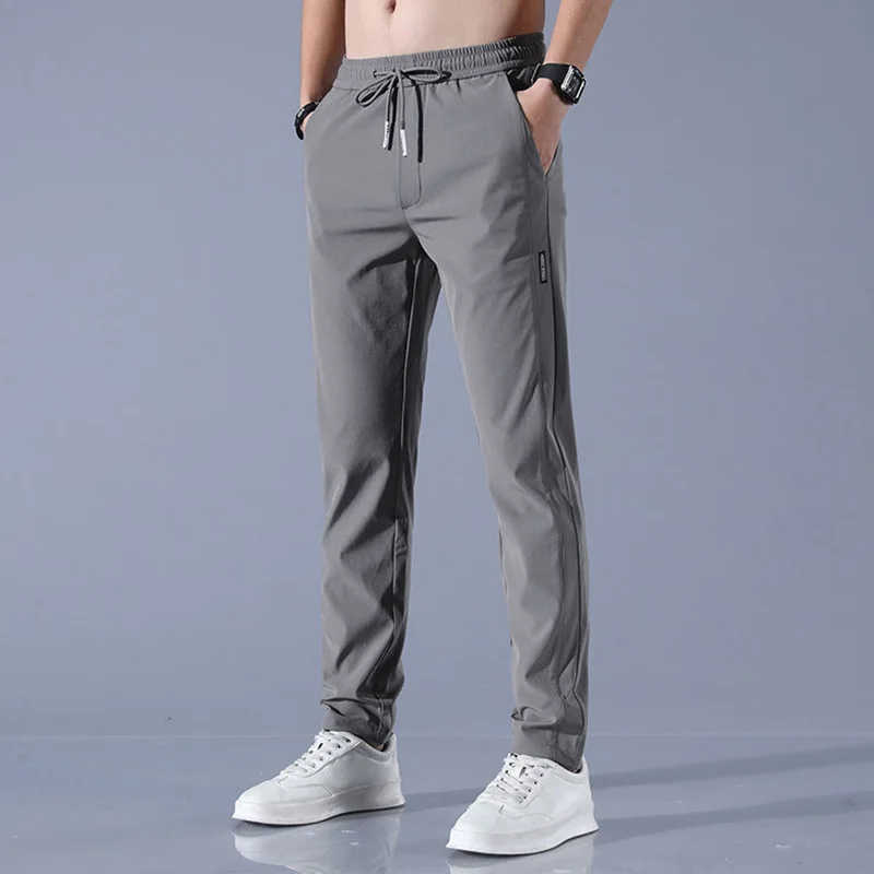 

Men Sweatpants Spring Autumn Jogging Sport Pants Elastic Straight Breathable Fitness Trousers for Mens Thin Running Joggers Male
