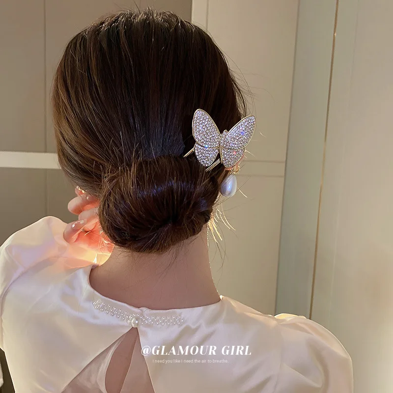 

Light Luxury Flash Diamond Pearl Butterfly Hairpin High-grade Ball Head Coil Net Red Ins Temperament