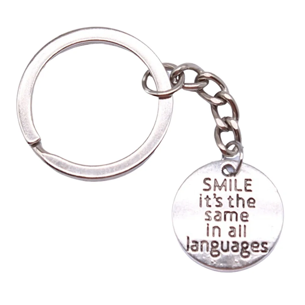 Сувениры подарок мужской брелок 2 цвета 20 мм улыбка такая же на всех языках