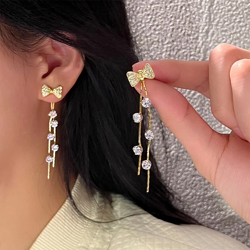 

Fashion simple style long tassel bow zircon stud earrings for women designed temperament personality stud earring