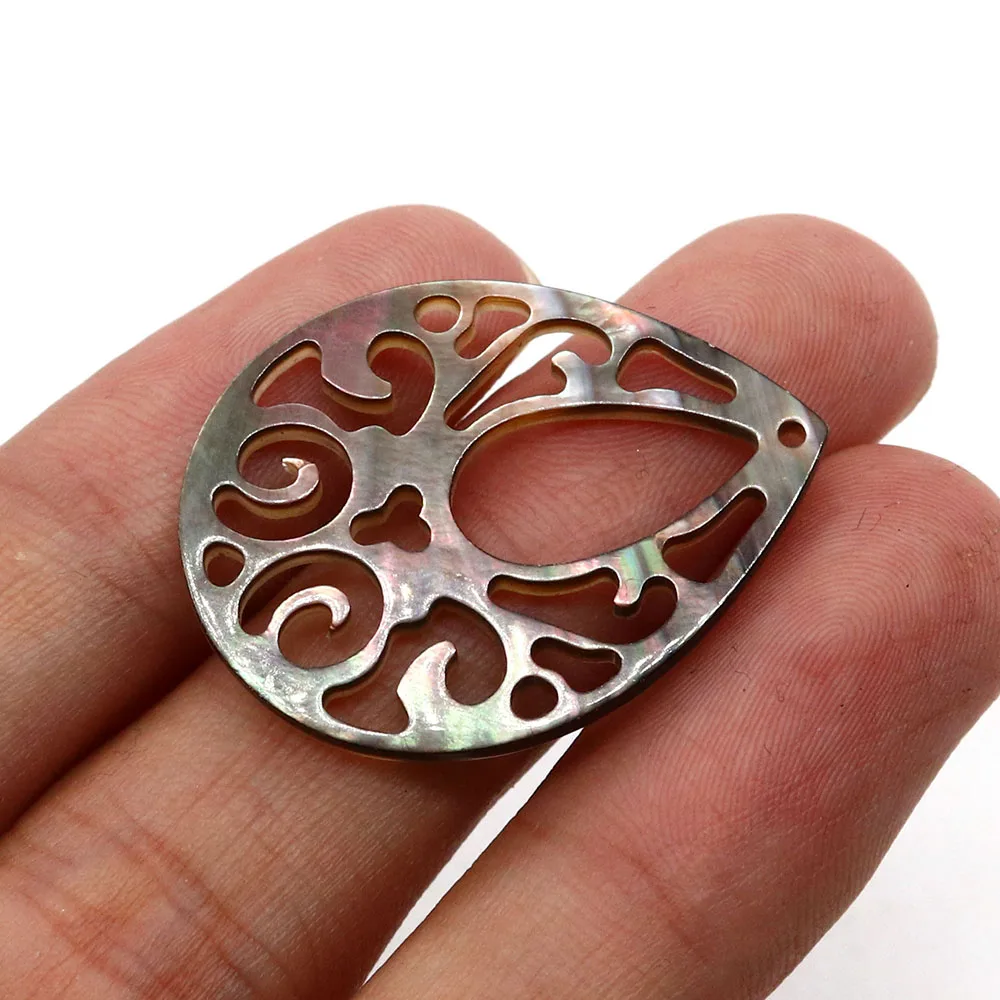 Кулон в форме капли с резьбой из натуральной желтой ракушки 25x33 мм изысканная