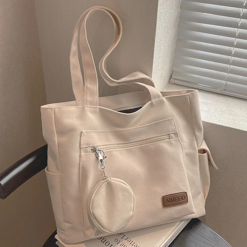 

Solid Color Canvas Shopping Bag for Women Multi-pocket Handbag Messenger Bag Large Capacity Women's Tote Bag Shoulder Bag Simple