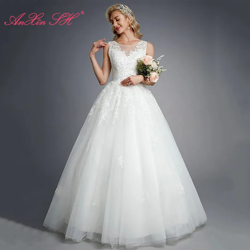 

Белое кружевное свадебное платье AnXin SH принцессы с цветами, модное свадебное платье с круглым вырезом и бисером, свадебное платье без рукаво...