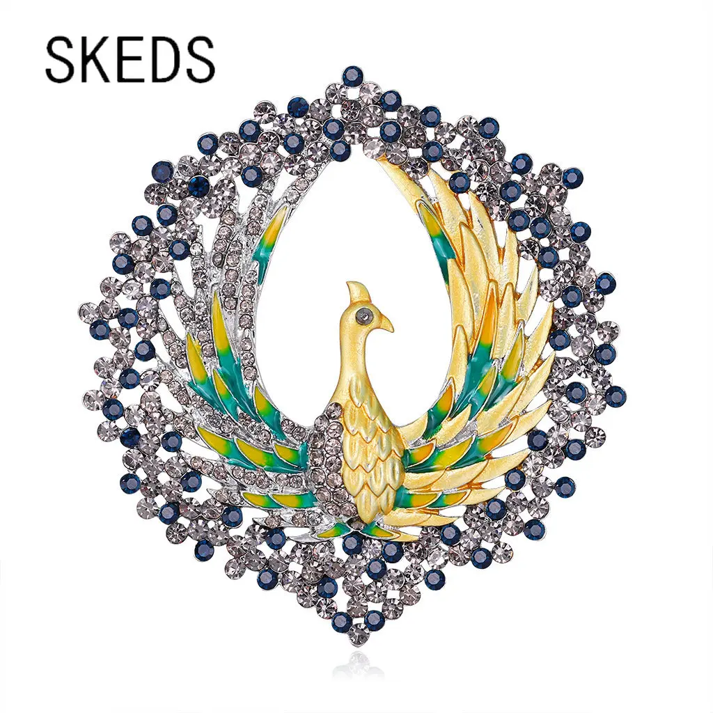 

SKEDS New Creative Exquisite Rhinestone Peacock Enamel Brooch Pin For Women Lady Fashion Luxury Round Animal Badges Pins Gift