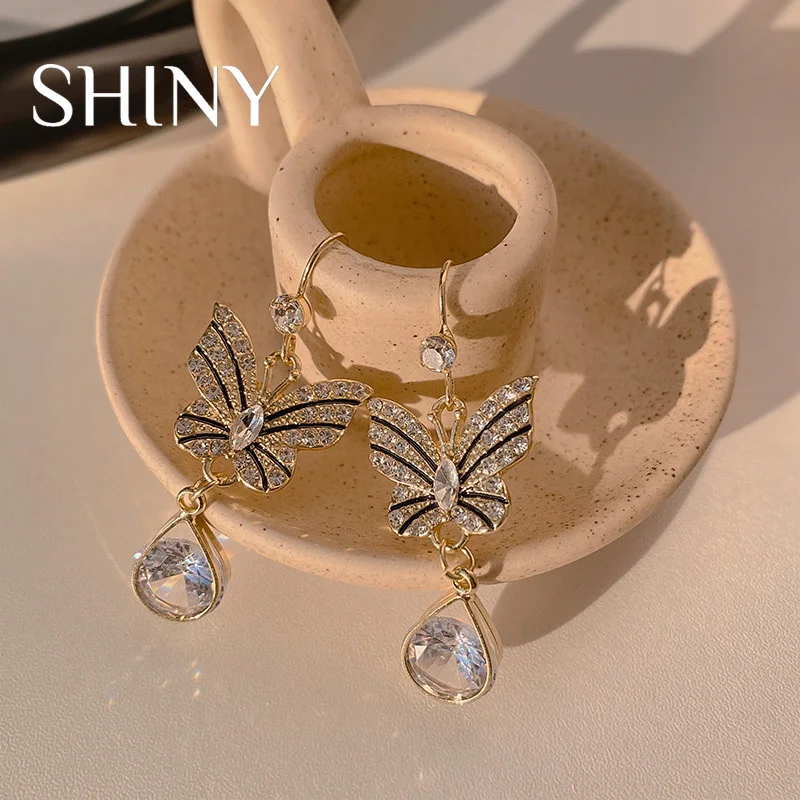 

South Korea 2022 Trendy Zircon Bow Earrings Fashion Personality Temperament Versatile Light Luxury Ear Hook Earrings For Women