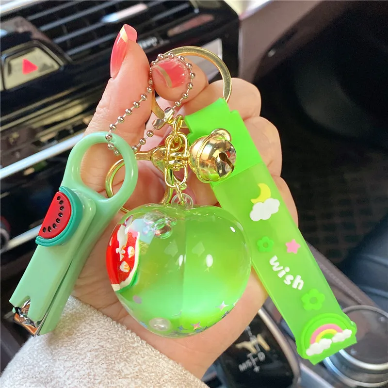 

Fashion Creative Keychain into Oil Peach Grape Liquid Floating Bottle Holiday Gift Pendant Couple Leather Bag Lanyard Wholesale