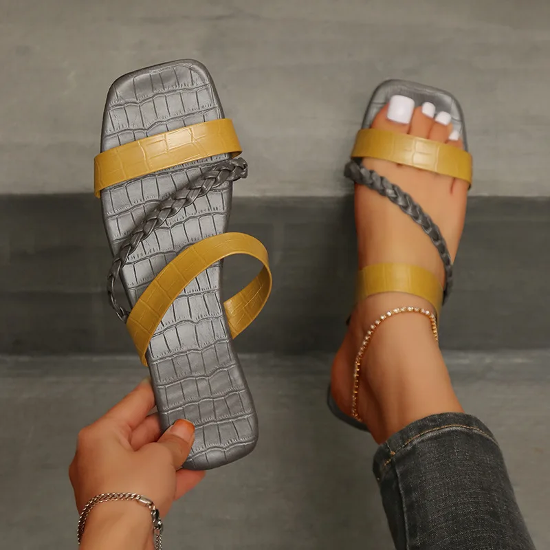 summer 2022 large size slippers women's woven flat-heeled fashion slippers Europe cross one word two wear beach sandals female