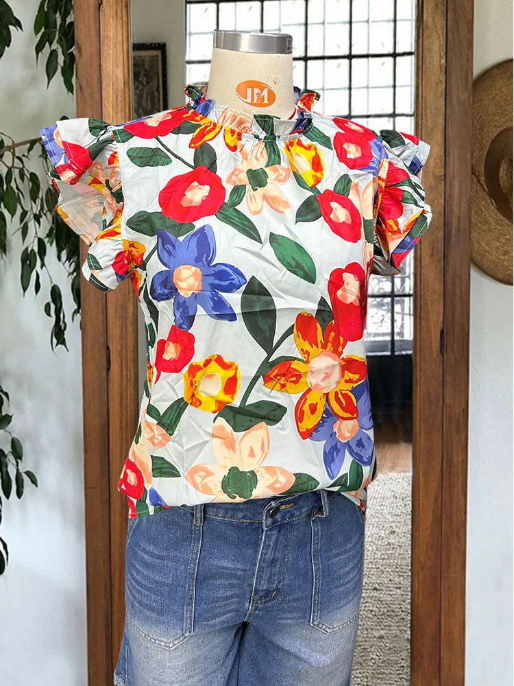 Разноцветная блузка с цветочным принтом и рюшами на рукавах многоуровневая