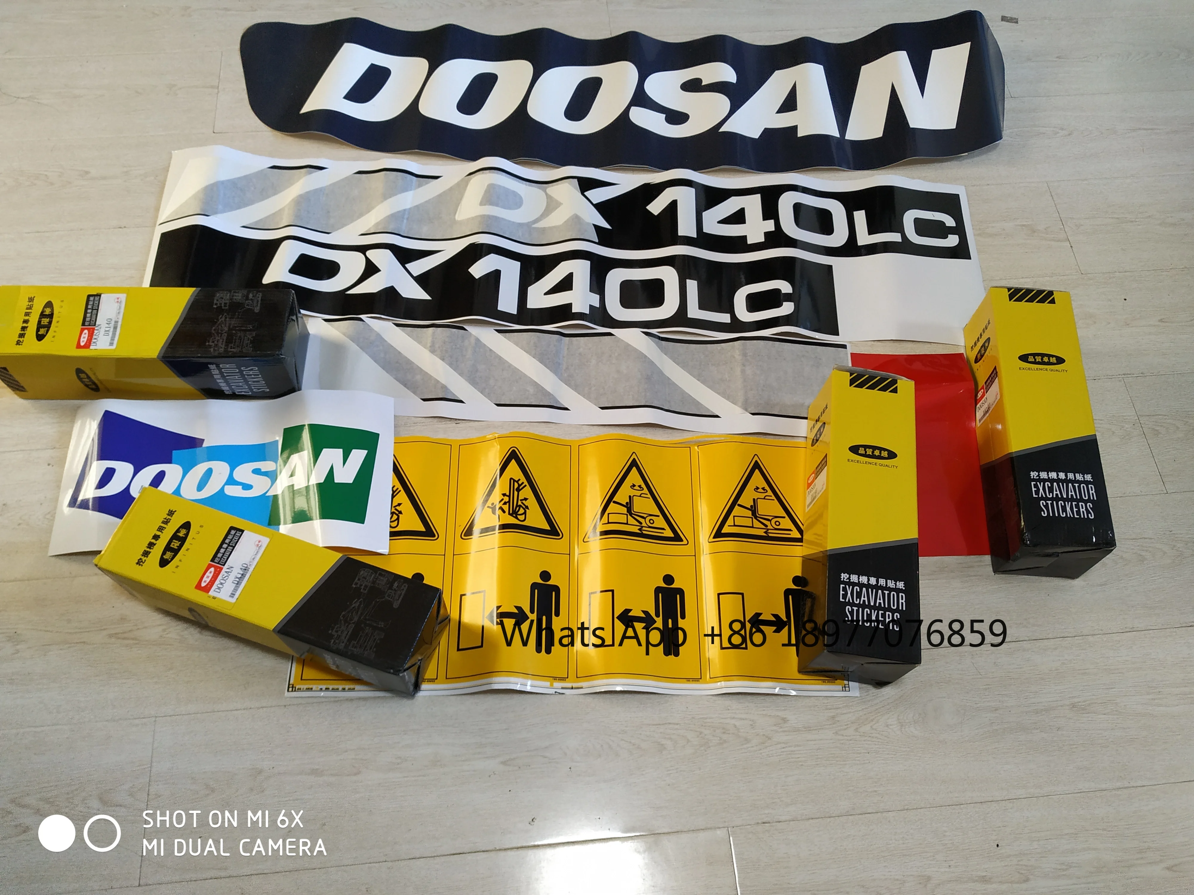 Наклейки на экскаватор DX140LC