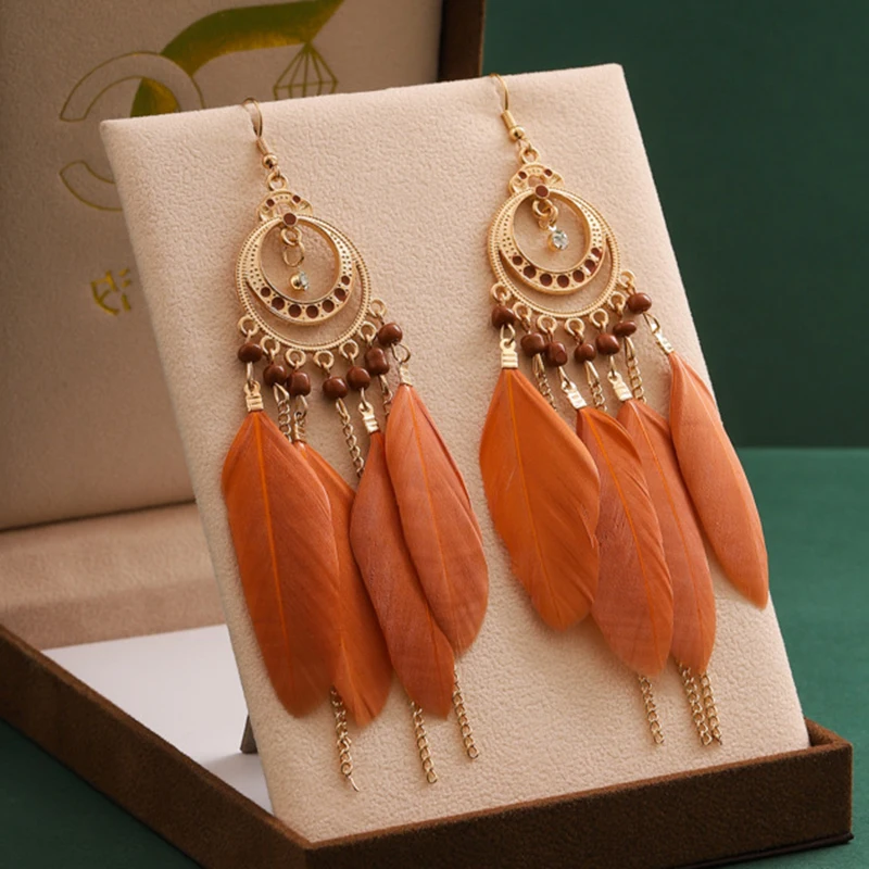 

Classic Bohemian Ethnic Feather Earrings for Women Retro Drop Glaze Round Hollw Bead Dangle Earrings Vacation Party Jewelry Gift