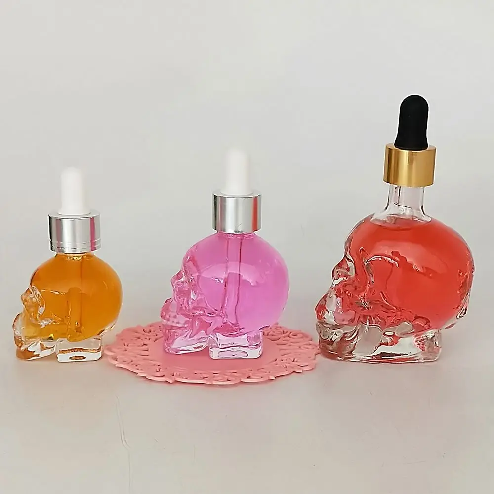 

Transparent Skull Shape Bottle with Pipette Empty Glass Liquid Dropper Bottle Dispenser Personality Cosmetic Containers