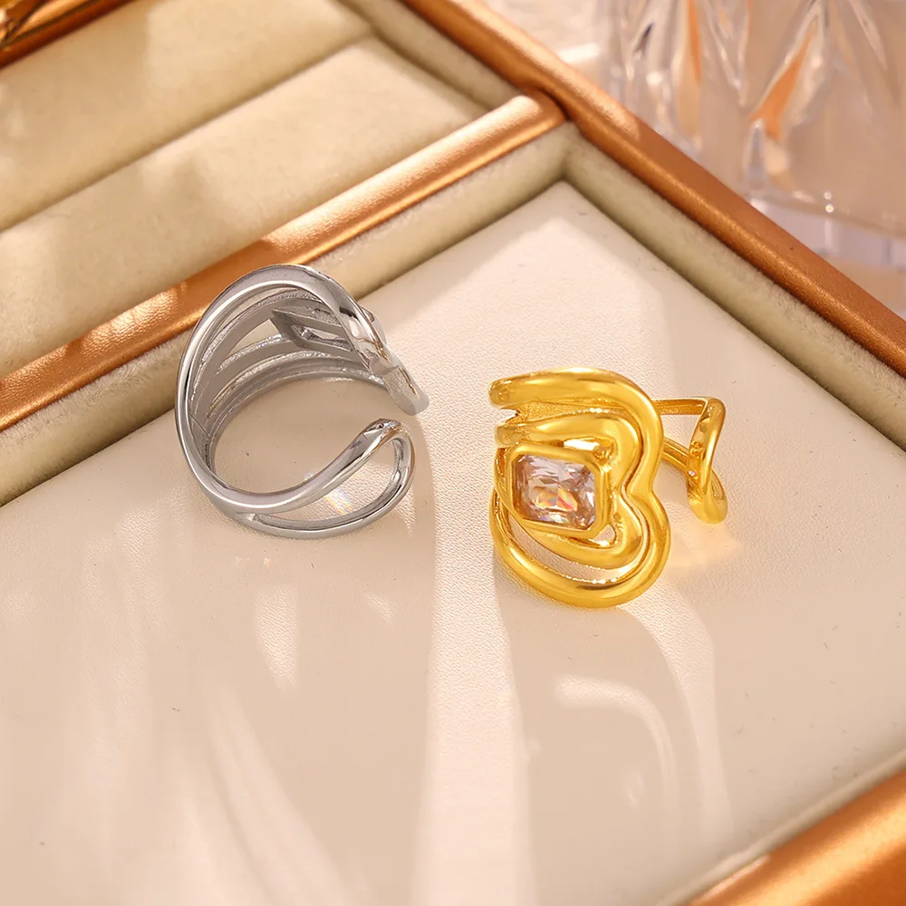 Женское кольцо из нержавеющей стали с позолотой и белым стеклом