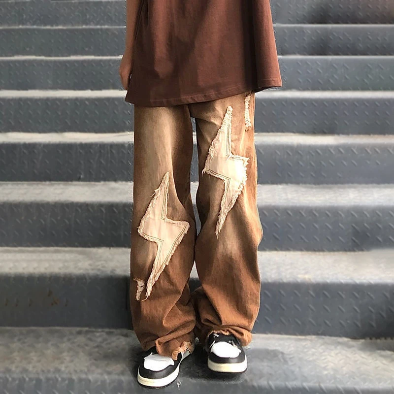 

Мужские рваные джинсы в стиле хип-хоп