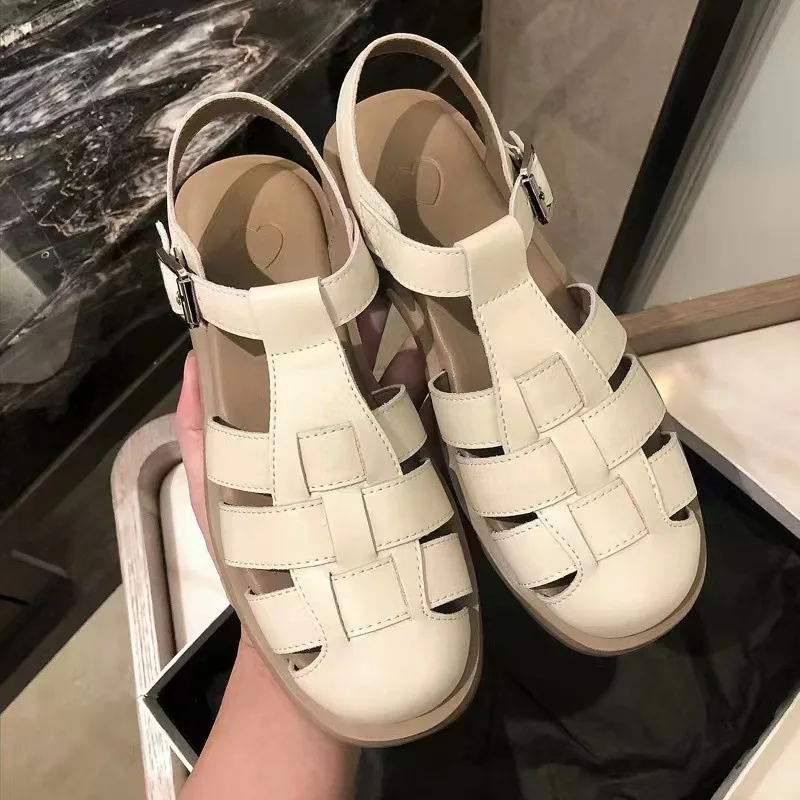 

Baotou Sandals Women's Summer 2023 Thick Sole Retro French Knitted Soft Sole Flat Roman Sandals Women's Sand