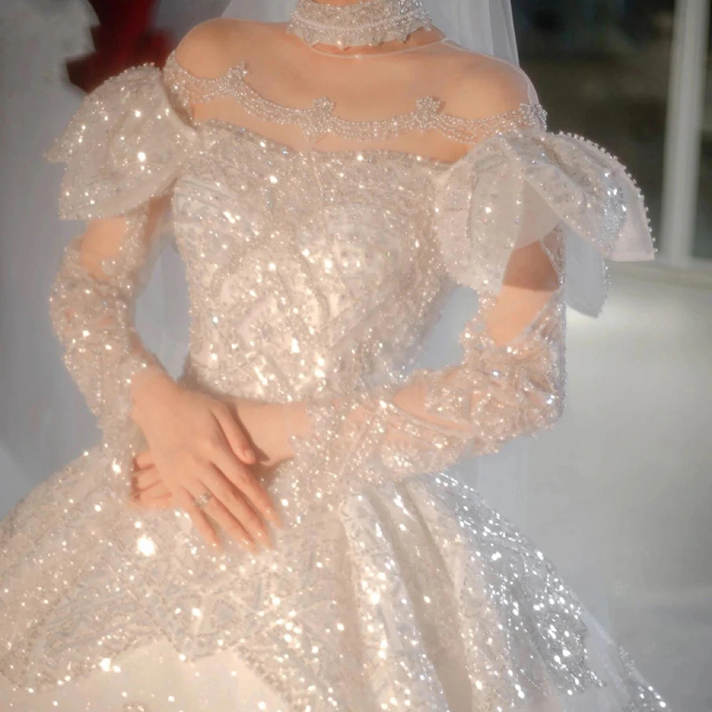 

Luxury Long Sleeve Wedding Dresses Beading Sequined Detachable Illusion O Neck Shinning Gorgeous Bridal Gowns Sweep Train 2023