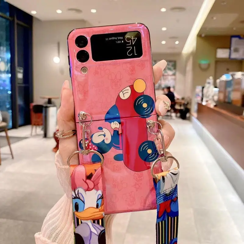 

Mickey Minnie is suitable for Samsung galaxyZFlip3 mobile phone case folding screen Blu-ray silicone mobile phone case