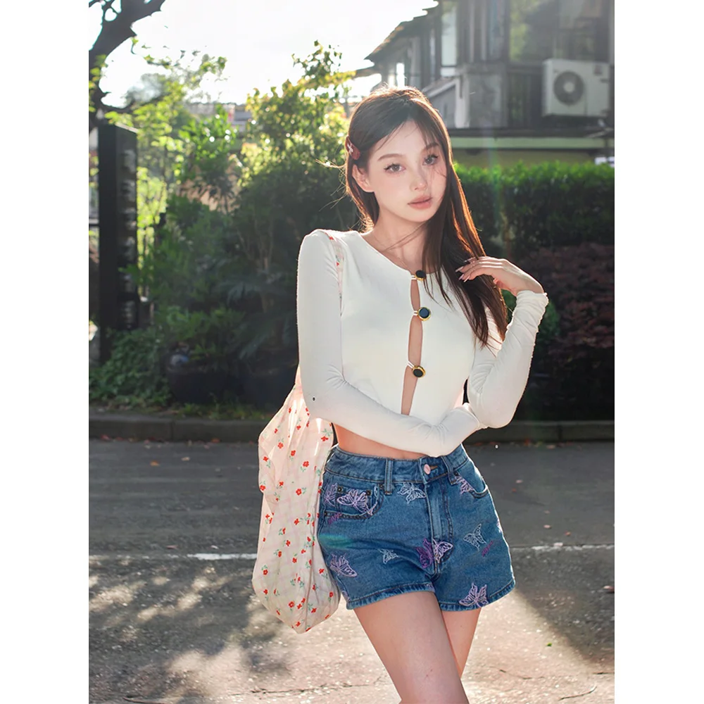 

23 new hot girls sexy wind chest hollow top round neck collar design long-sleeved knitted open fir female