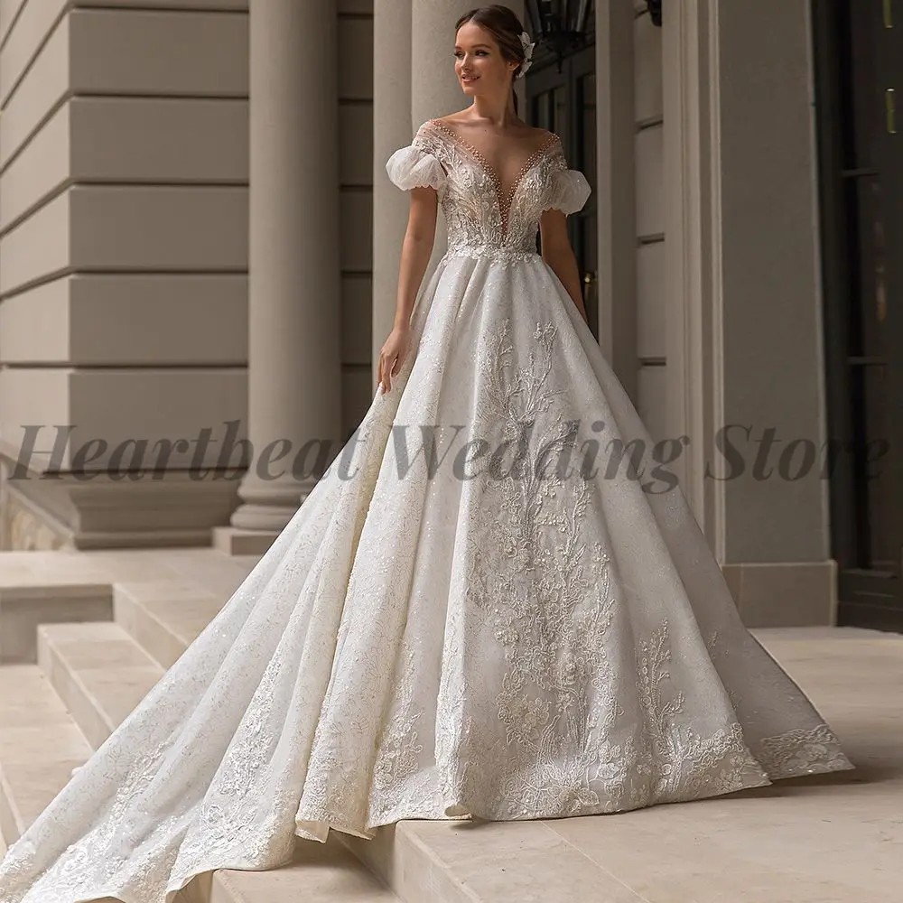 

Classic Wedding Dress 2023 with V-Neck Short Sleeves Court Train Button Back and Applique Sequin Beads A-Line Style for Brides