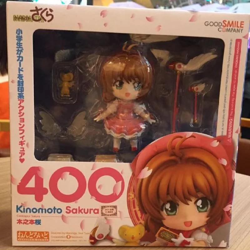 

Boxed 10CM 2023 Anime Card Captor Kinomoto SAKURA 400# Q version Kawaii PVC Figure Model Toys Movable face changing doll Gifts