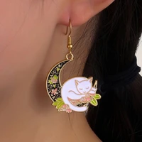 new moon hugging girl earrings