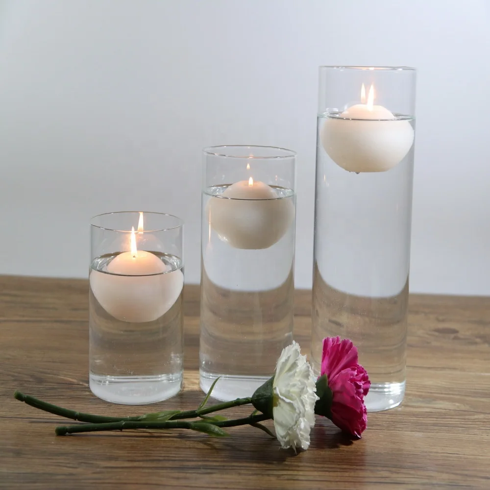 

wedding cylinder vases centerpiece with floating candles inside
