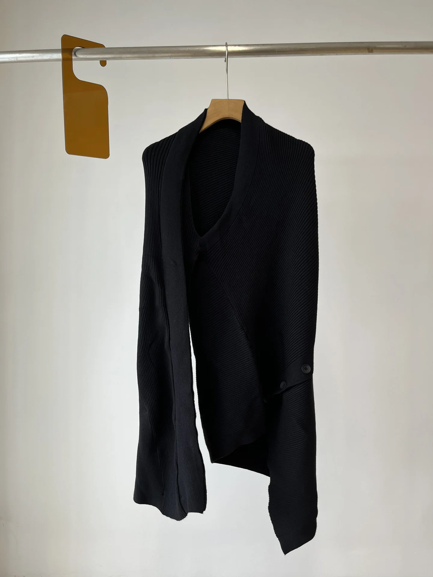 

Asymmetric detachable sweater with one arm partially detachable sleeve for long sleeve or asymmetric half sleeve