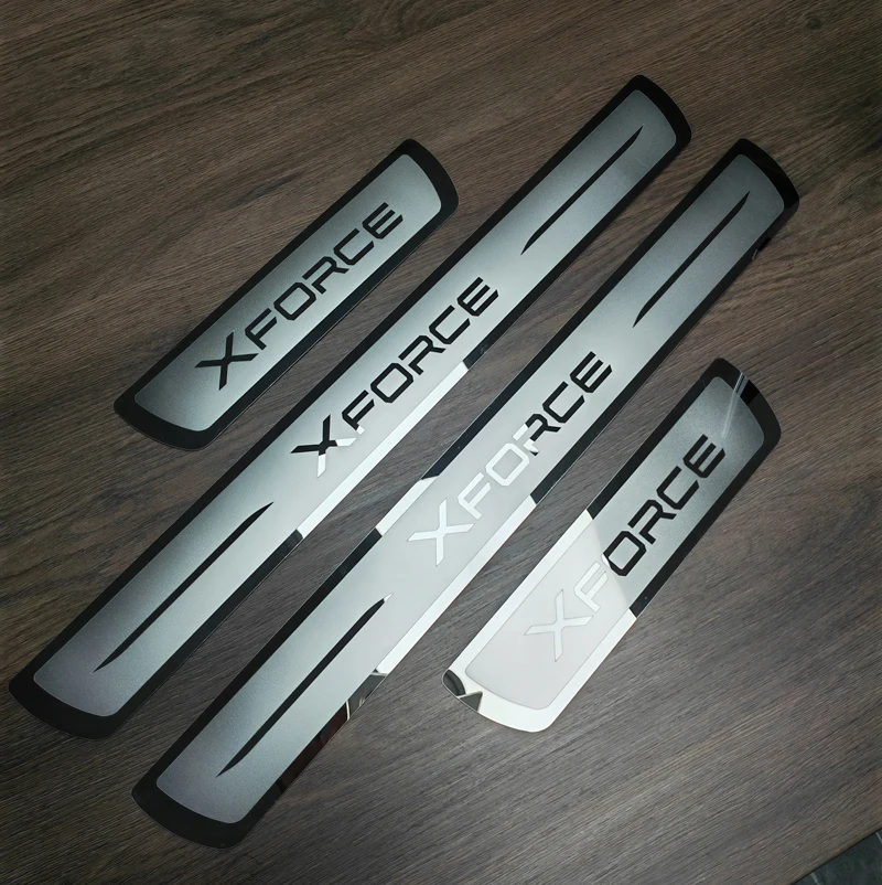 Фото Автомобильные наклейки на пороги из нержавеющей стали для Mitsubishi XFORCE 2024 №1