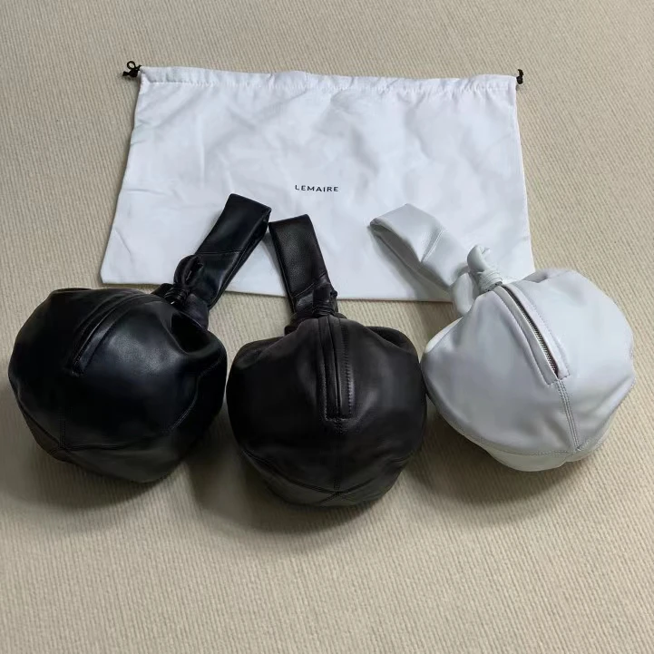 

Женская сумка-кошелек из овечьей кожи