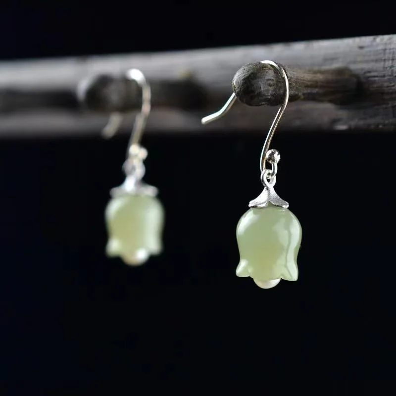 

Classical Elegant Artificial White Jade Lily Earrings Retro Temperament Jade Earrings Antique Earrings Female Ethnic Style