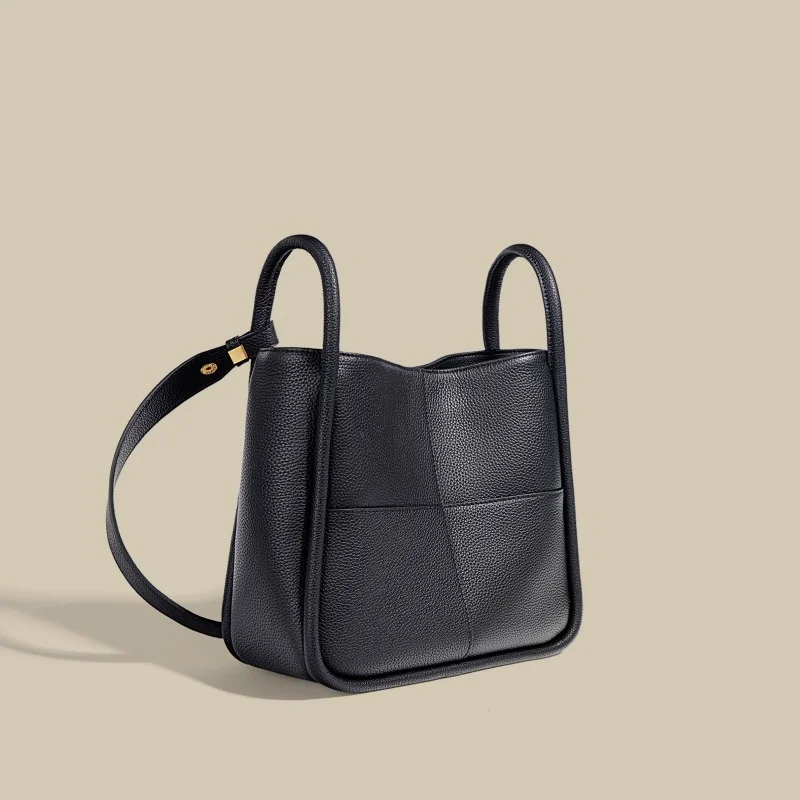 

Togo Cowhide Bucket Bag Niche Shoulder Underarm Bag Female Simple Commute Crossbody Portable Vegetable Basket Bag