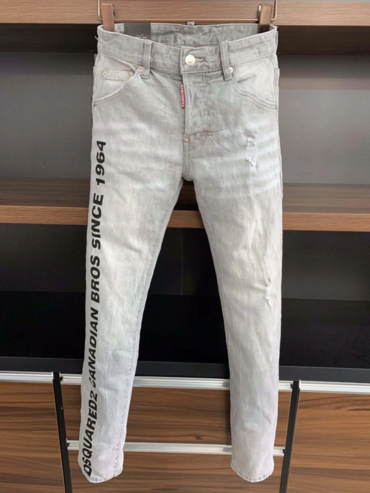 

2023 summer hot selling denim trousers for men D2 jeans washed white full hole patch slightly elastic feet casual