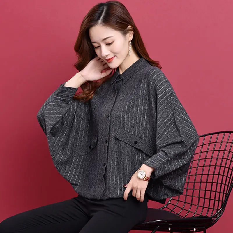 

Loose bat sleeve knitted sweater women autumn and winter Korean outside with bright silk knitted vertical stripes lapel sweater