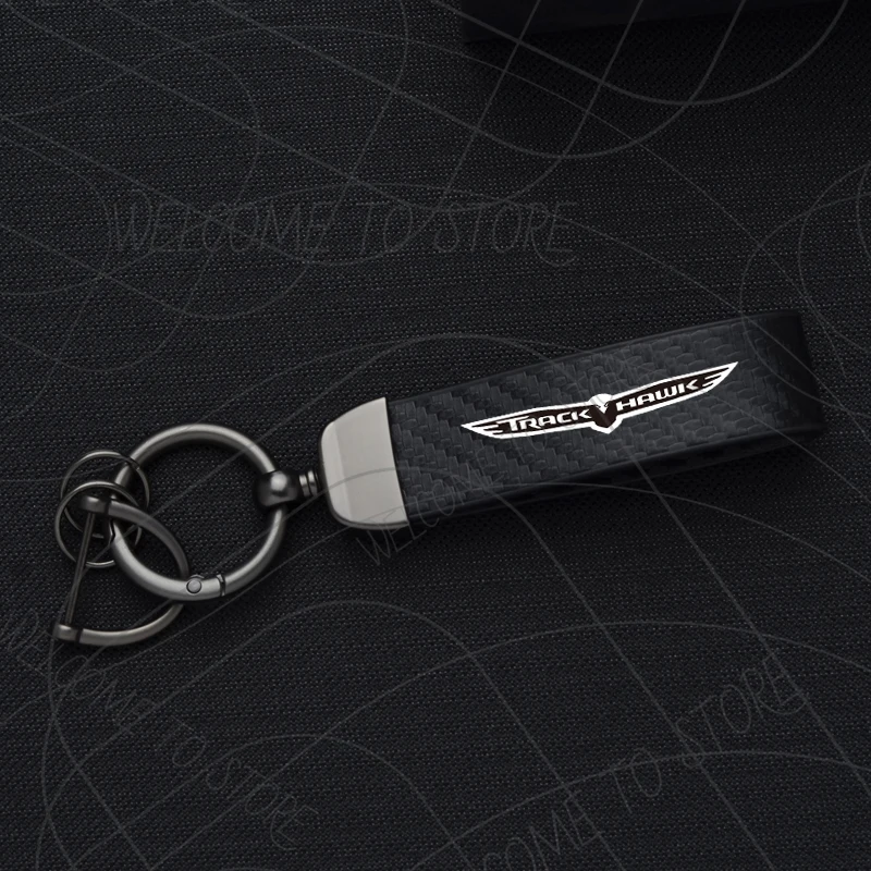 

Автомобильный брелок из искусственной кожи с логотипом Trackhawk Grand Cherokee Gladiator Sahara, брелок из углеродного волокна, цинковый сплав, автомобильный брелок, аксессуары