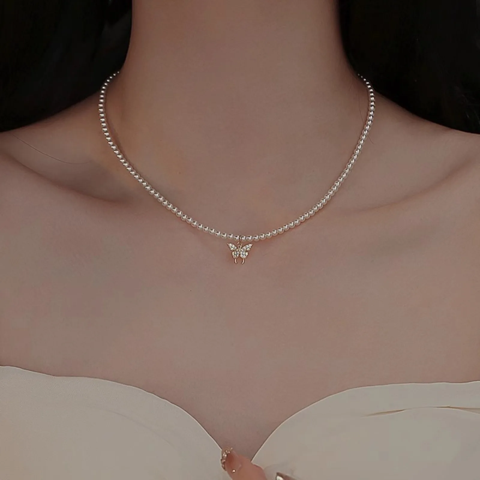 Серебряное ожерелье-бабочка с жемчужной цепочкой