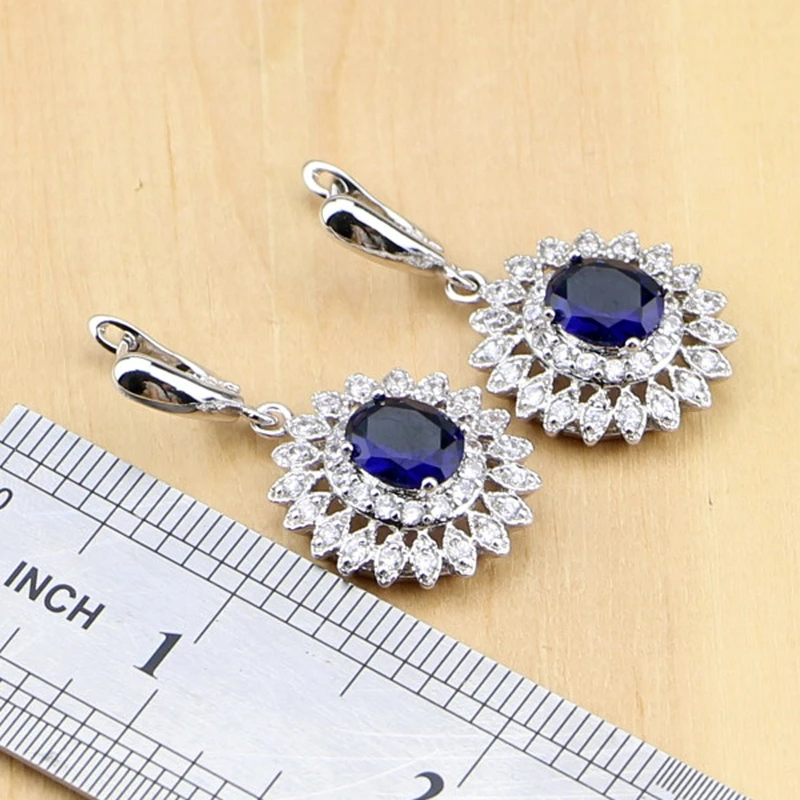 Комплект из колье серёг и кольца серебра 925 пробы