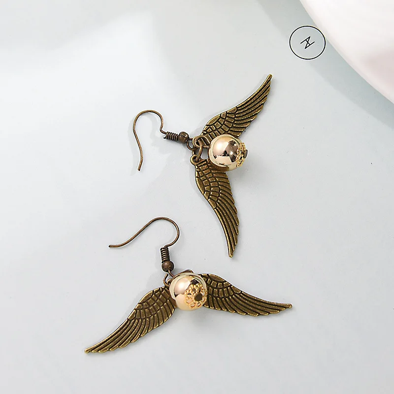 Женские популярные круглые серьги-гвоздики с крыльями в стиле ретро |