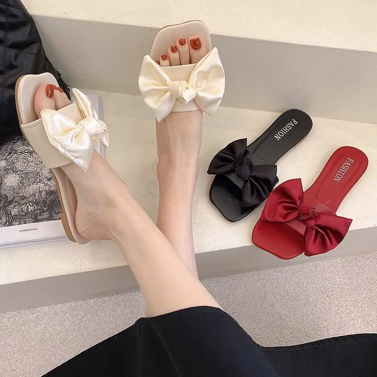 

Women Spring Summer Fashion Solid Color Plus Size Slippers Women Bow Tie Flat Heel Anti Skidding Beach Shoes Sandals Slippers