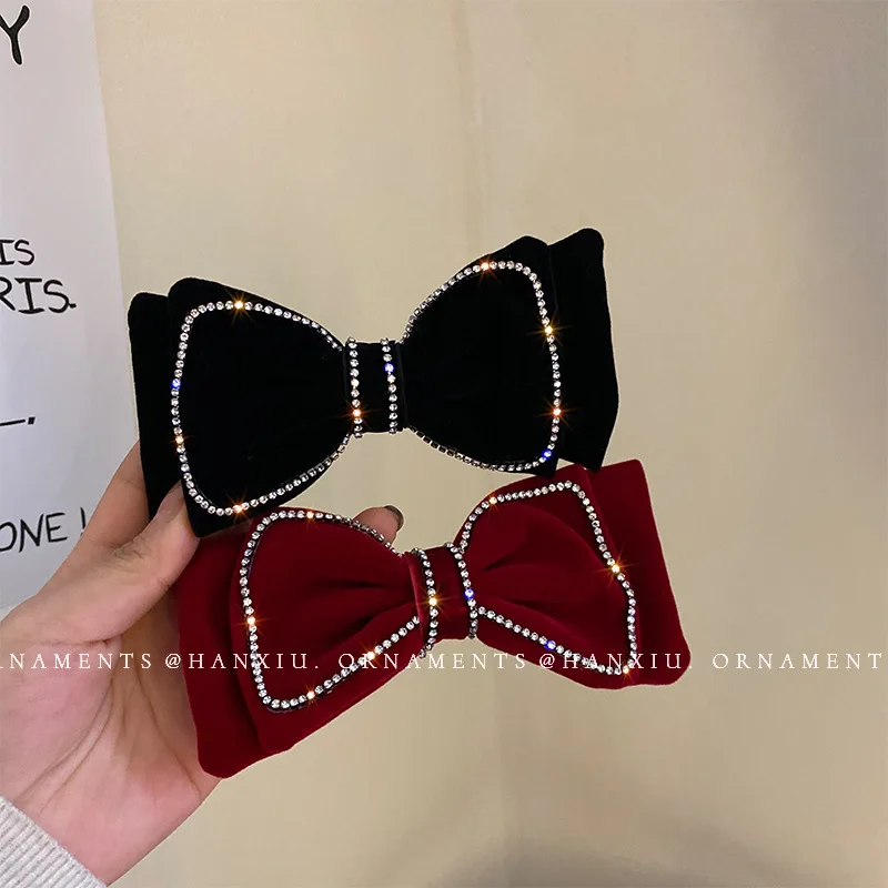 

Заколка для волос с кристаллами и бархатным бантом женская