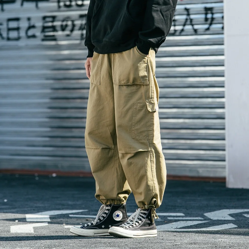 

Japanese cargo pants men's fashion brand loose nine - leg wide - rope - tied pants hip hop